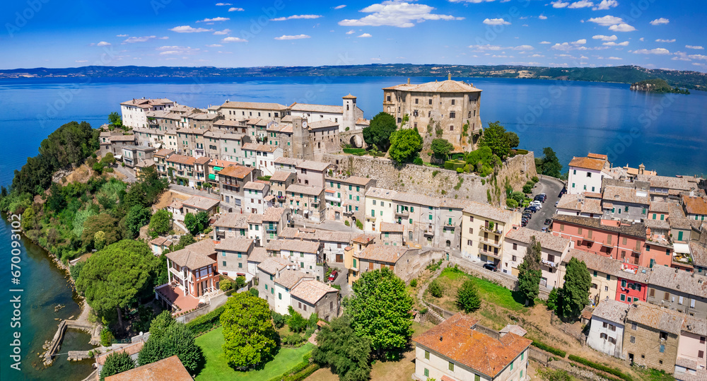 Wall mural scenic lakes of italy - beautiful bolsena. aerial view of capodimonte medieval village. viterbo prov