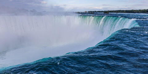 Close-up and near view of the Horseshoe falls with base in Niagara Falls, Canada
