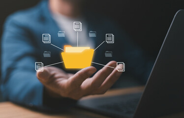 Document Management System DMS, Businessman with Online Document Database and automated icons processes in file management Search and manage document database files online,store, manage.