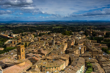 Siena Italy beautiful medieval city in Tuscany famous for landscape the Torre del Mangia Basilica...