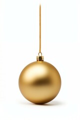 A sparkling gold Christmas ornament hanging from a delicate cord