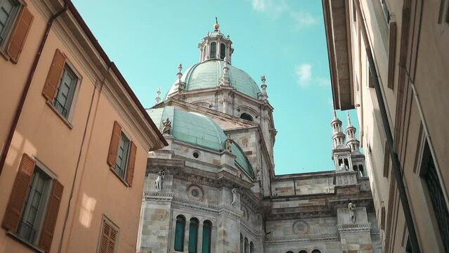 architectural element of Saint Mary Assunta Cathedral, Como lake during sunny summer day. Italy. High quality FullHD footage