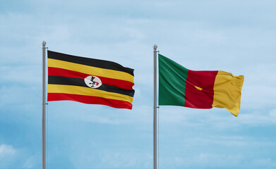 Cameroon and Uganda flags, country relationship concept