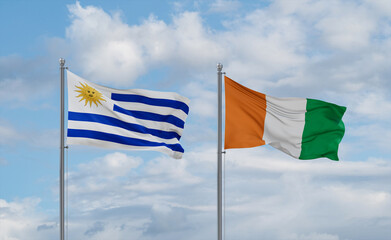 Ivory Coast and Uruguay flags, country relationship concept