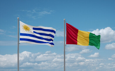 Guinea and Uruguay flags, country relationship concept