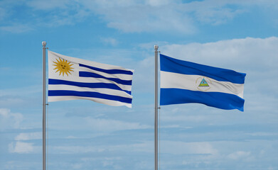 Nicaragua and Uruguay flags, country relationship concept