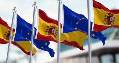 Spanish and European Union flags waving in the wind