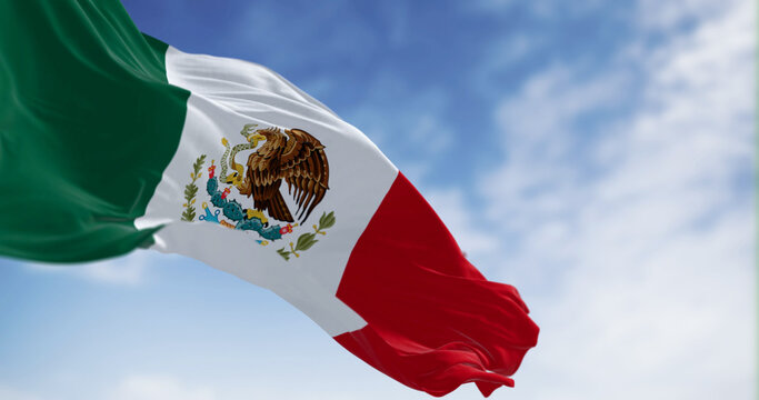 Mexico national flag waving on a clear day