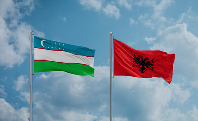 Uzbekistan and Albania national flags, country relationship concept