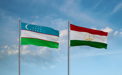 Tajikistan and Uzbekistan flags, country relationship concept