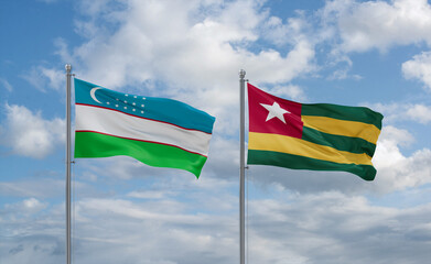 Togo and Uzbekistan flags, country relationship concept