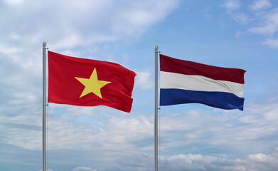 Netherlands and Vietnam flags, country relationship concept