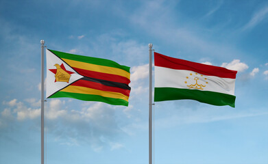 Tajikistan and Zimbabwe flags, country relationship concept