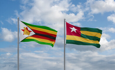 Togo and Zimbabwe flags, country relationship concept