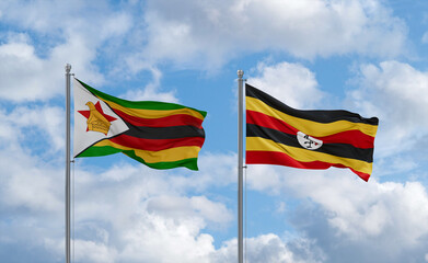 Uganda and Zimbabwe flags, country relationship concept