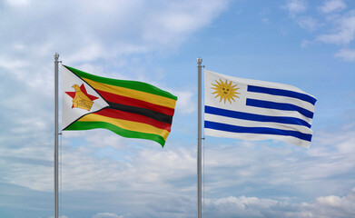 Uruguay and Zimbabwe flags, country relationship concept