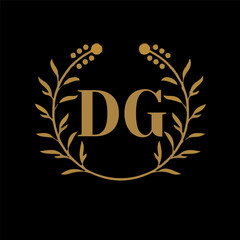 DG letter branding logo design with a leaf