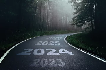 Foto op Canvas 2024 New Year road trip travel and future vision concept . Nature landscape with highway road leading forward to happy new year celebration in the beginning of 2024 for fresh and successful start . © Urupong