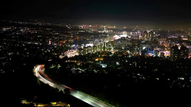 Almaty city at night with Al-Farabi Avenue view