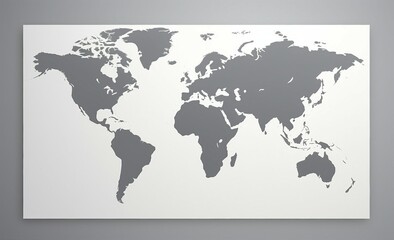 A world map hanging on a white wall