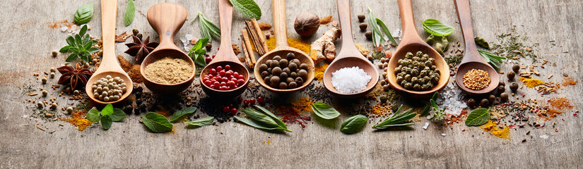 Mix spices and herbs on wooden board