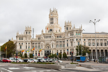 Madrid, Spain - 23 November 2022: City skyline at Cibeles Fountain Town Square and traffic