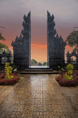 A Buddhist temple in the evening in the rain. The Brahmavihara-Arama temple has beautiful gardens...