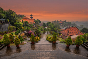 A Buddhist temple in the evening in the rain. The Brahmavihara-Arama temple has beautiful gardens...