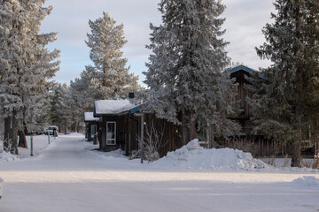 Naklejka premium Winter landscape of the town of Jukkasjarvi, Sweden. Situated in the north of Sweden in Kiruna municipality.