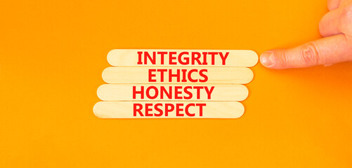 Integrity ethics honesty respect symbol. Concept word Integrity Ethics Honesty Respect on beautiful wooden stick. Beautiful orange table background. Business integrity ethics honesty respect concept.