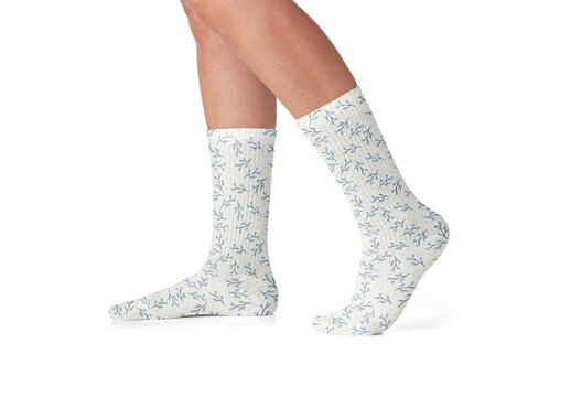 Mockup of woman, side view, wearing customizable socks