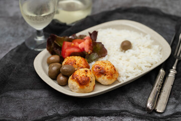 Chicken meatballs with salad and boiled rice