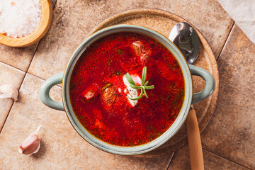 Traditional Ukrainian beet soup - borscht on the table top view