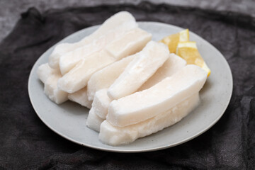 Fresh frozen squid on plate