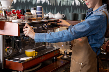 Closeup. Professional barista prepares coffee. young woman making coffee Alternative ways to make coffee coffee shop concept