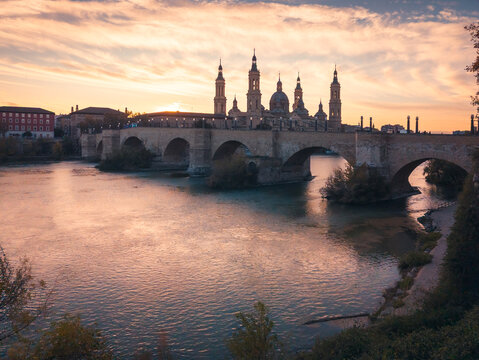 Arched Stone Bridge And Basilica Of Nuestra Senora del Pilar Over