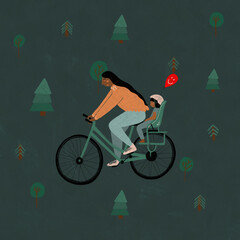 Woman cycling with child and balloon in forest