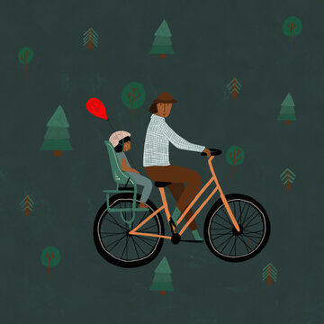 Man cycling with child and balloon in forest