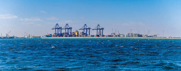 A panorama view across the waters of Walvis Bay, Namibia in the dry season - obrazy, fototapety, plakaty