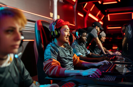Esports players intensely competing in a gaming tournament