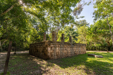 The ruins of a beautiful pyramid in the archaeological zone of Chichen Itza in Mexico.