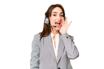 Telemarketer caucasian woman working with a headset over isolated chroma key background shouting...