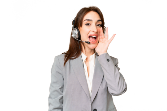 Telemarketer caucasian woman working with a headset over isolated chroma key background shouting with mouth wide open