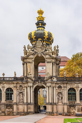 Fototapeta na wymiar Fragment of inner courtyard of Zwinger Palace (Der Dresdner Zwinger). Rococo style Zwinger Palace was Royal palace XVII century in Dresden, Germany.
