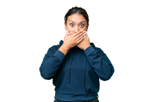 Young Uruguayan woman over isolated chroma key background covering mouth with hands