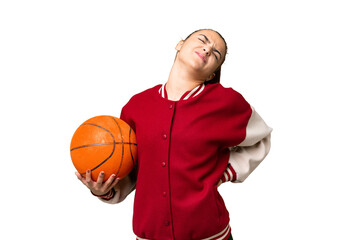 Young Woman playing basketball over isolated chroma key background suffering from backache for having made an effort