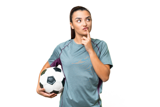 Young football player Woman over isolated chroma key background having doubts while looking up - Powered by Adobe