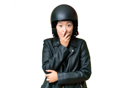 Young Asian woman with a motorcycle helmet over isolated chroma key background surprised and shocked while looking right