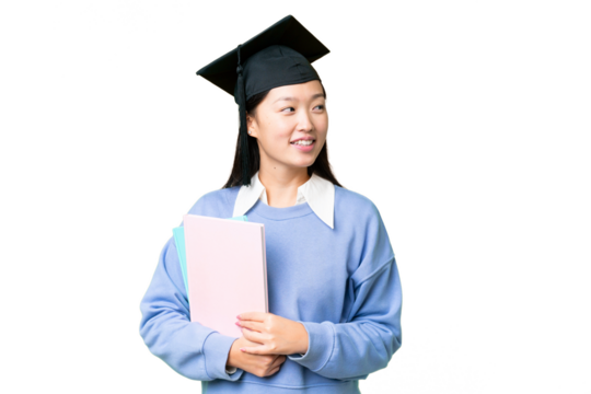 Young student woman over isolated chroma key background looking side