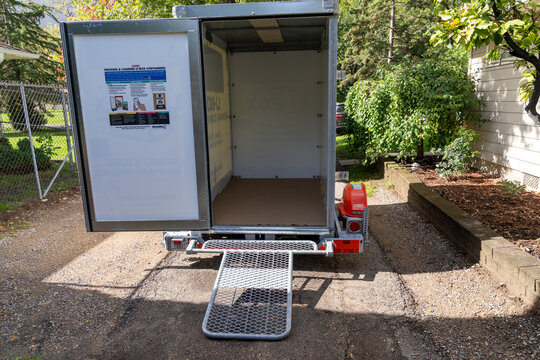 New Hope, Minnesota - October 14, 2023: U-Haul Ubox container pod, in a driveway, empty, ready for moving